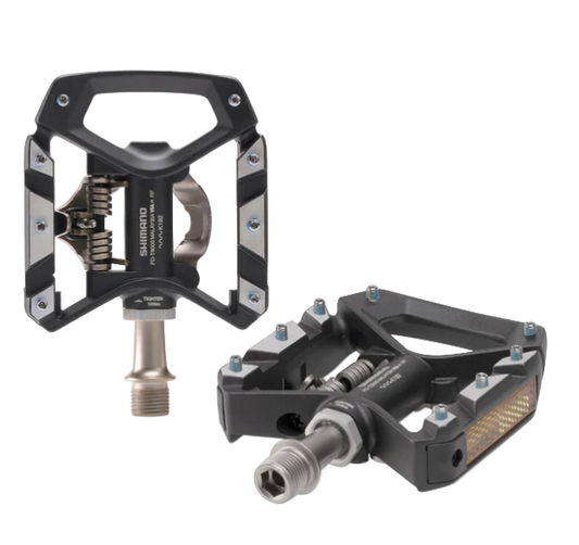 Pair of black bicycle pedals on a white background