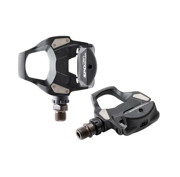 Pair of black bicycle pedals on a white background